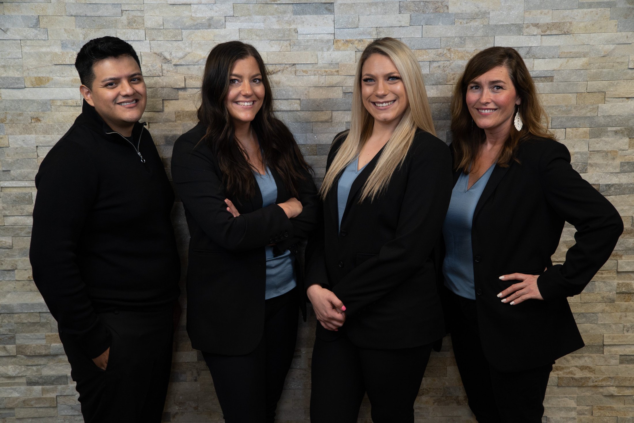 Group photo of the front desk team at Oral & Facial Surgery Center